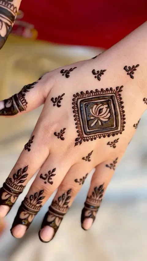 aesthetic minimal lotus back hand mehndi design