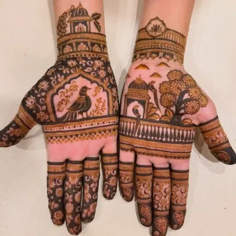 bridal indian figure finger mehndi design