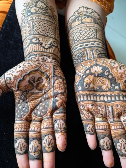 arabic indian figure back hand mehndi design