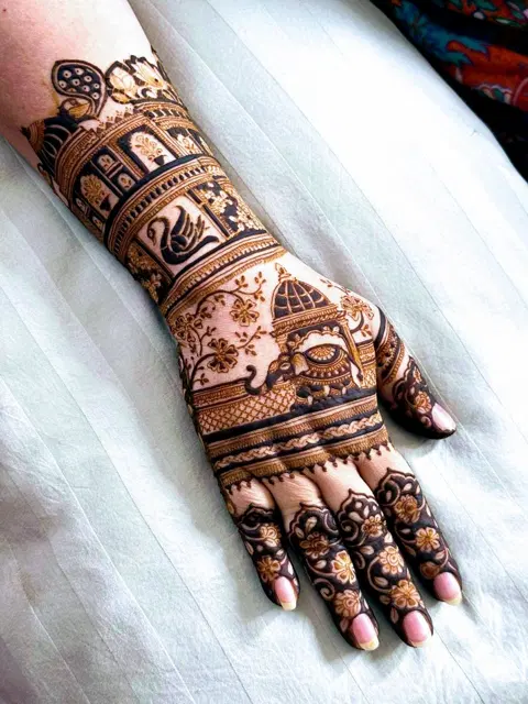 bridal indian figure arm mehndi design