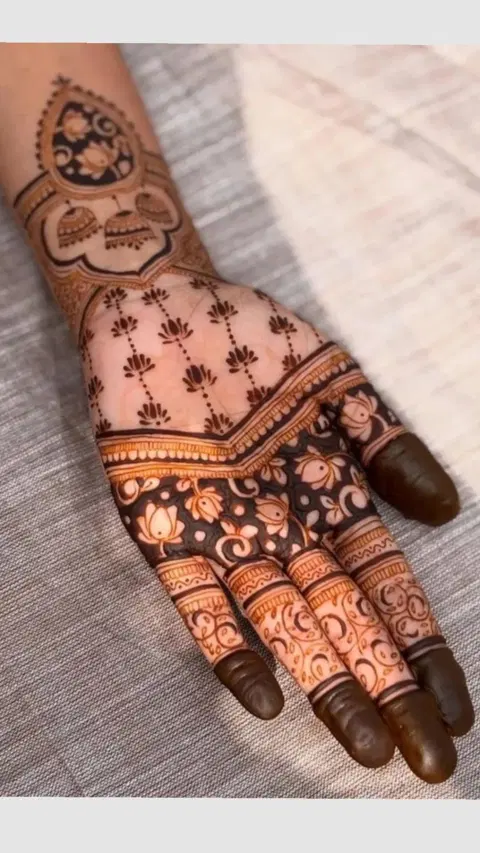 aesthetic bridal circle finger mehndi design
