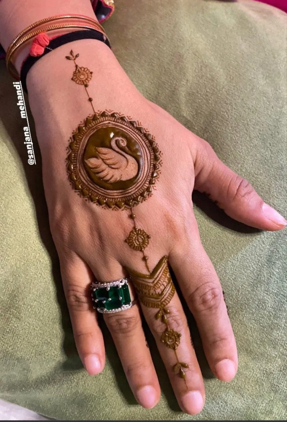Aesthetic Arabic Finger Mehndi Design with Gol Tikki, Deity and Peacock for Sawan (3)