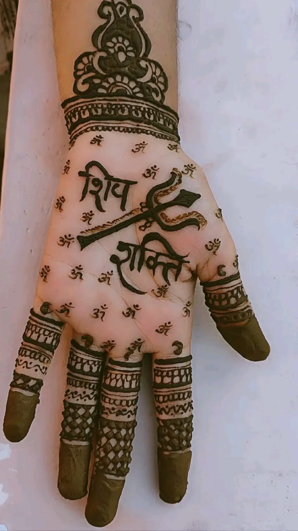 Indian Simple Back Hand Mehndi Design with Deity