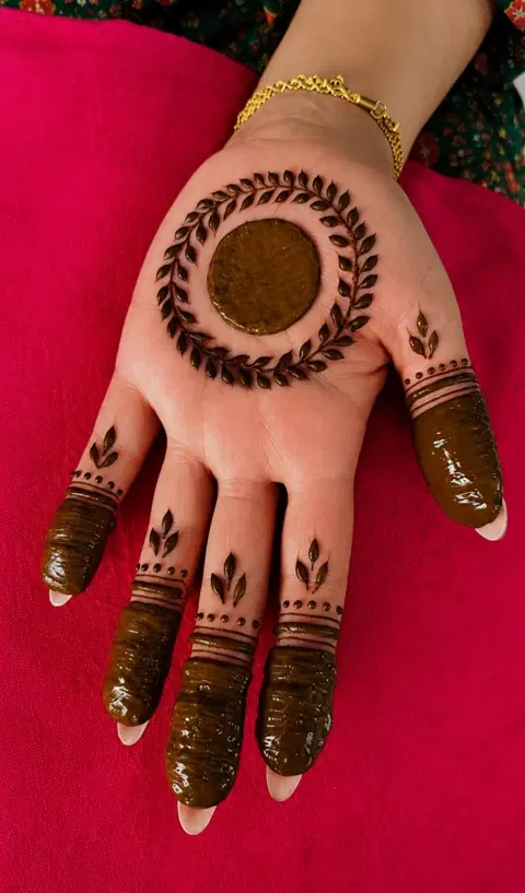 arabic bridal circle finger mehndi design