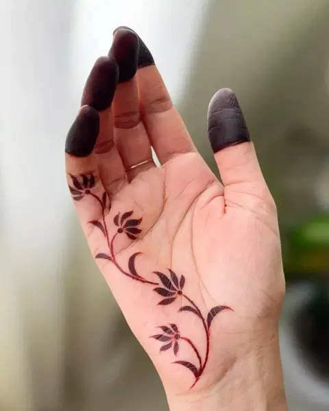 aesthetic arabic bel finger mehndi design
