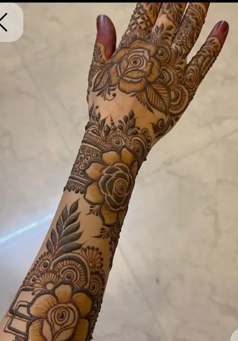 aesthetic arabic flower back hand mehndi design