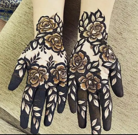 aesthetic arabic flower back hand mehndi design