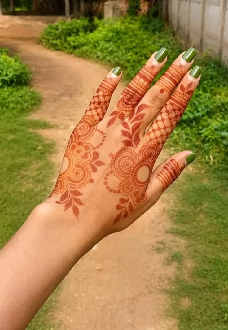 Aesthetic Simple Back Hand Mehndi Design with Gol Tikki and Flowers
