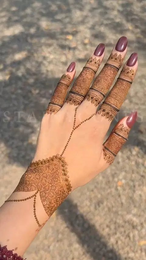 aesthetic bridal circle back hand mehndi design