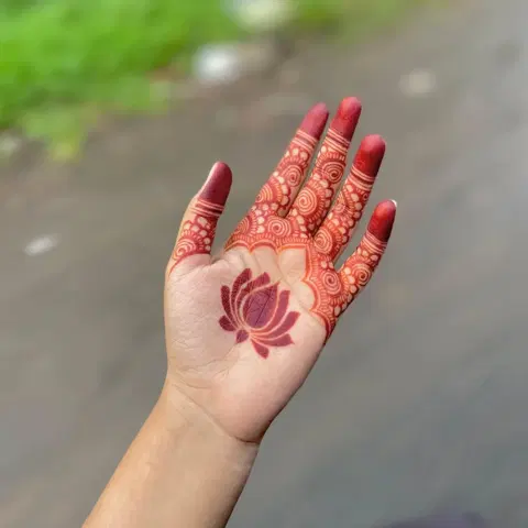 aesthetic simple lotus front hand mehndi design