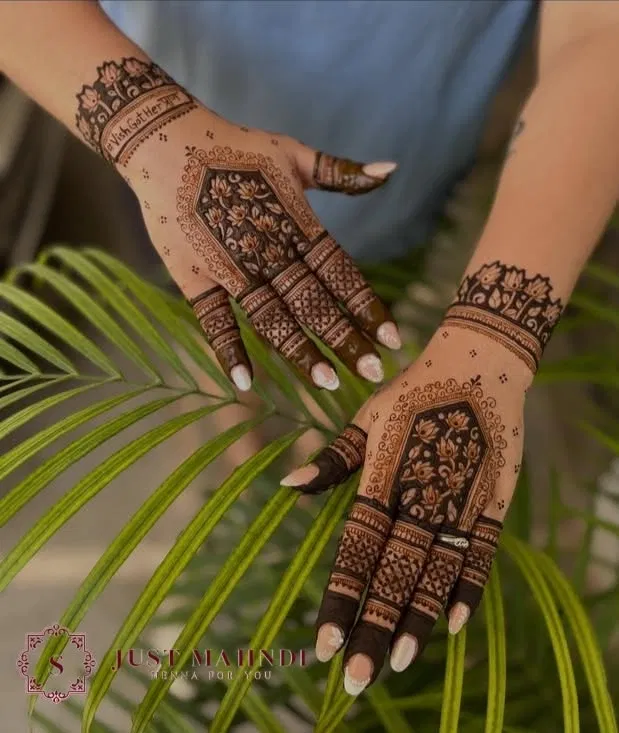 Aesthetic Minimal Back Hand Mehndi Design with Gol Tikki, Figures and Jaal (2)