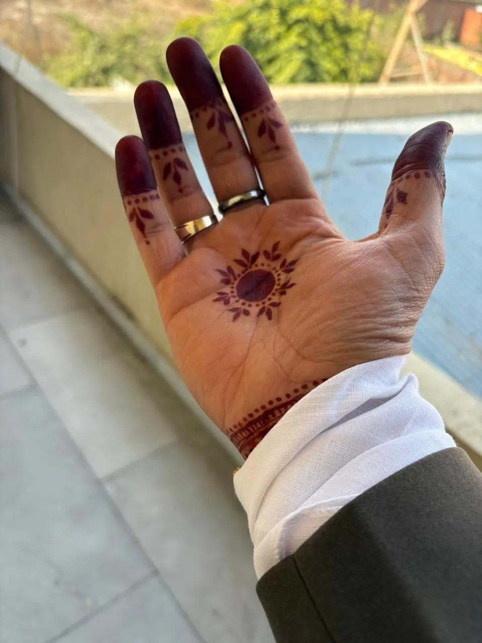 Bridal Minimal Back Hand Mehndi Design with Deity and Jaal