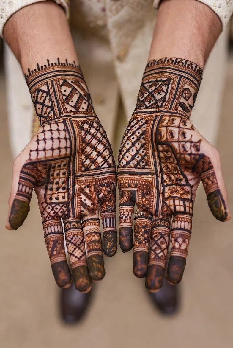 Stylish Front Hand Mehndi Design with Deity and Figures