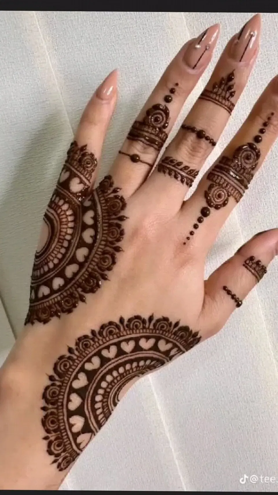 Simple Stylish Back Hand Mehndi Design with Bel and Hearts