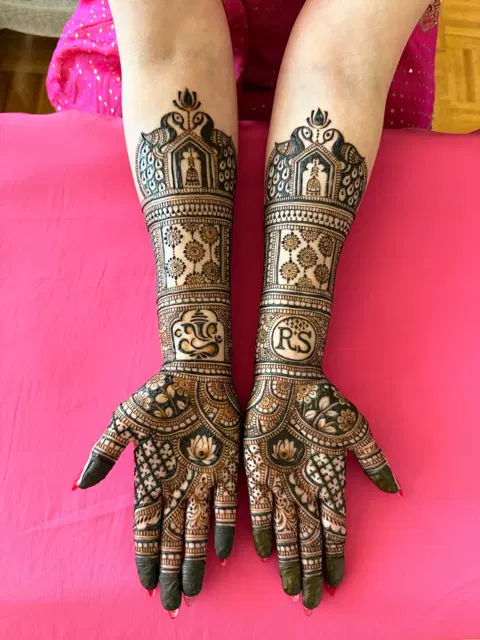 bridal stylish figure arm mehndi design