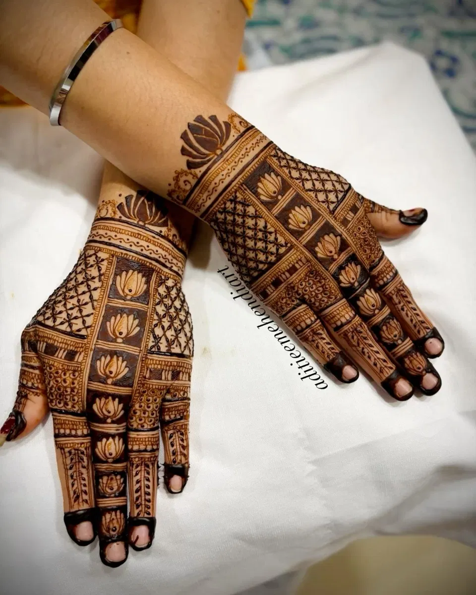Royal Stylish Back Hand Mehndi Design with Deity and Figures