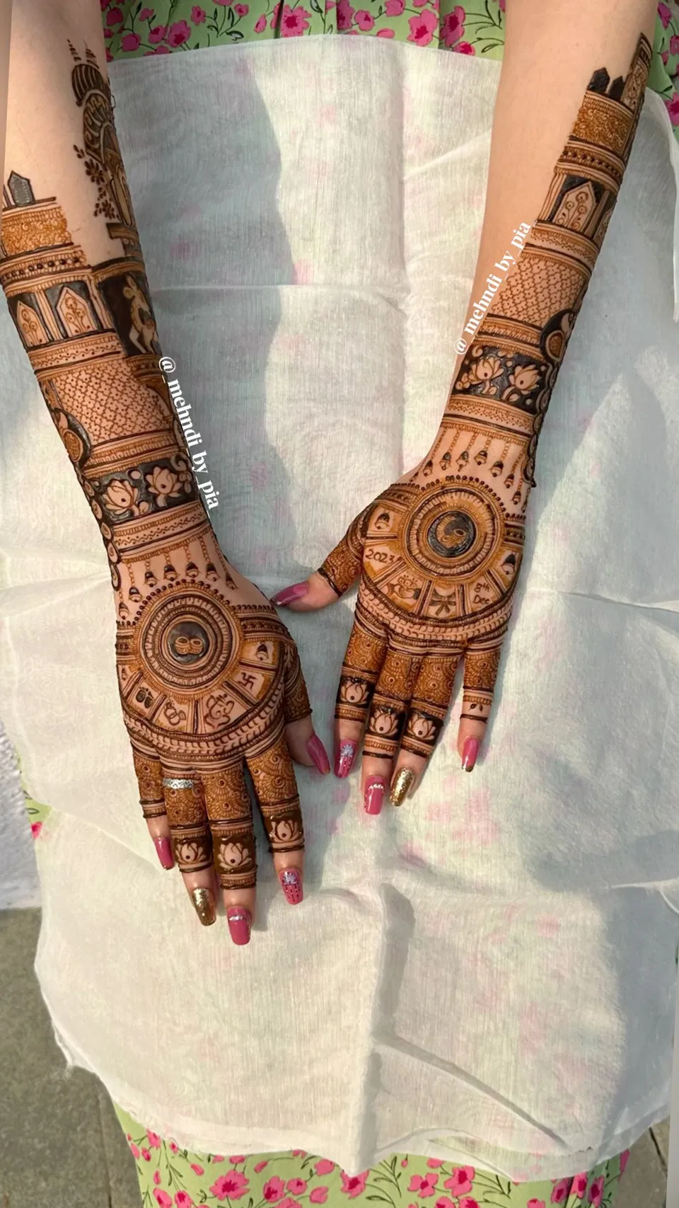 Bridal Back Hand Mehndi Design with Gol Tikki, Figures and Flowers for Engagement