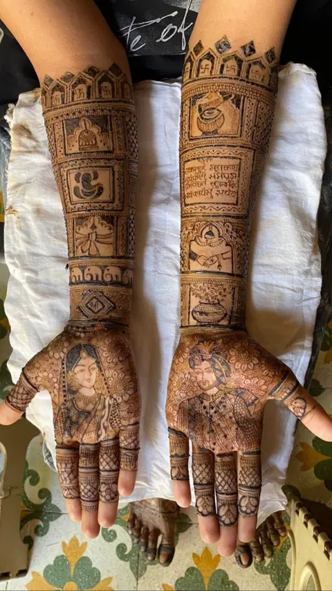 bridal deity back hand mehndi design