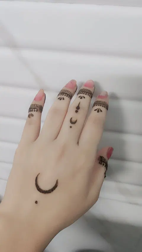 aesthetic arabic moon finger mehndi design
