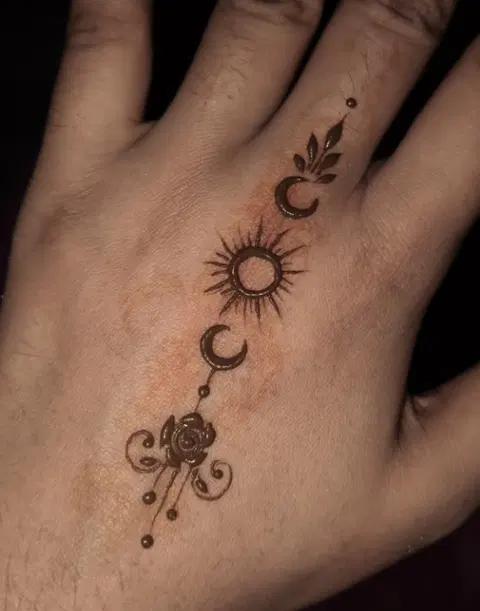 aesthetic arabic moon finger mehndi design