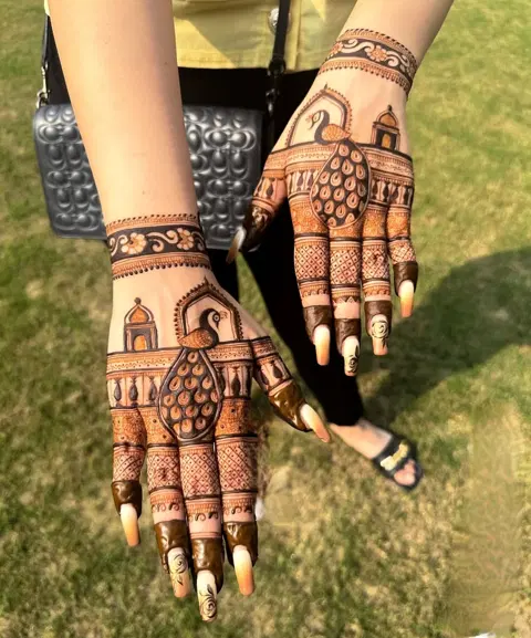 bridal indian peacock back hand mehndi design