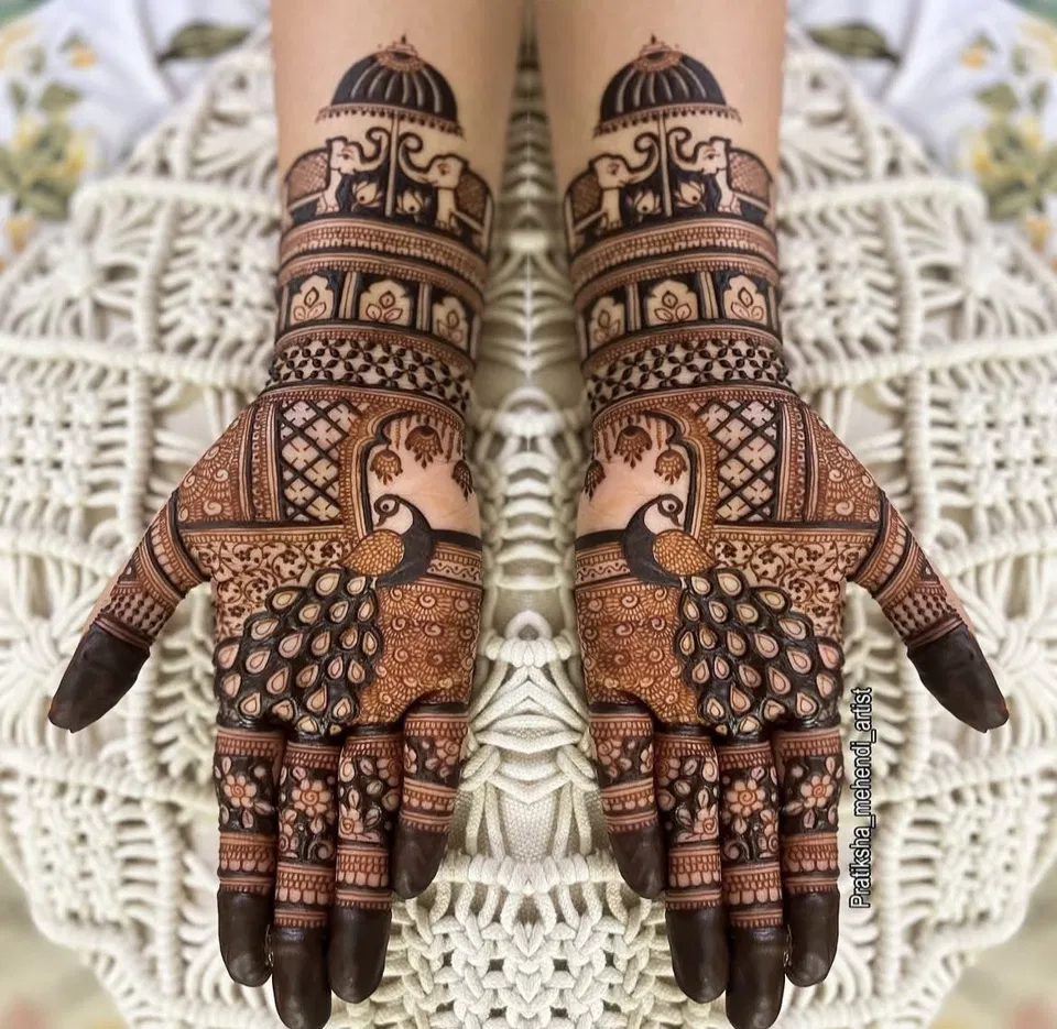 Aesthetic Indian Back Hand Mehndi Design with Figures and Peacock