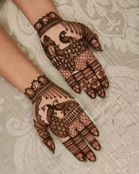 indian peacock back hand mehndi design