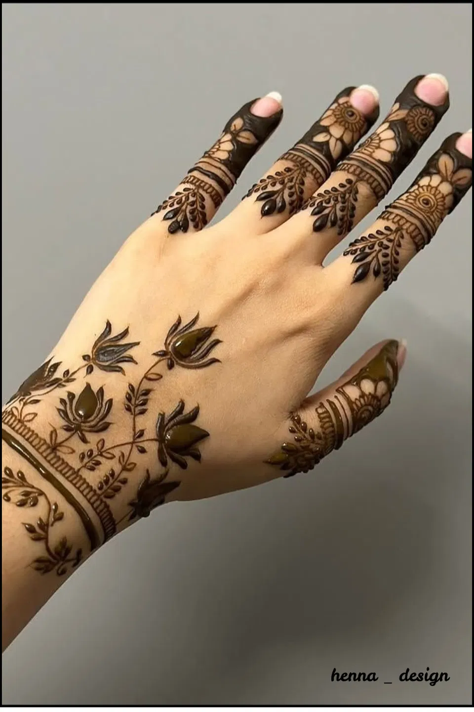 Aesthetic Minimal Back Hand Mehndi Design with Lotus (5)