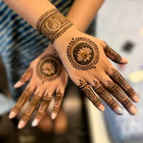 aesthetic simple circle back hand mehndi design