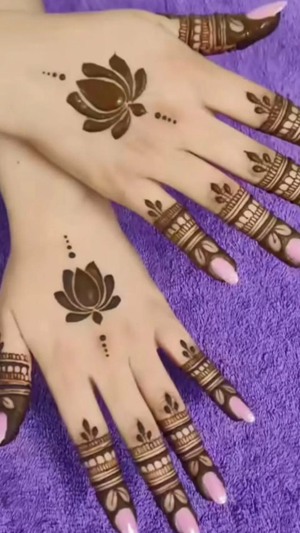 Aesthetic Simple Back Hand Mehndi Design with Lotus and Peacock