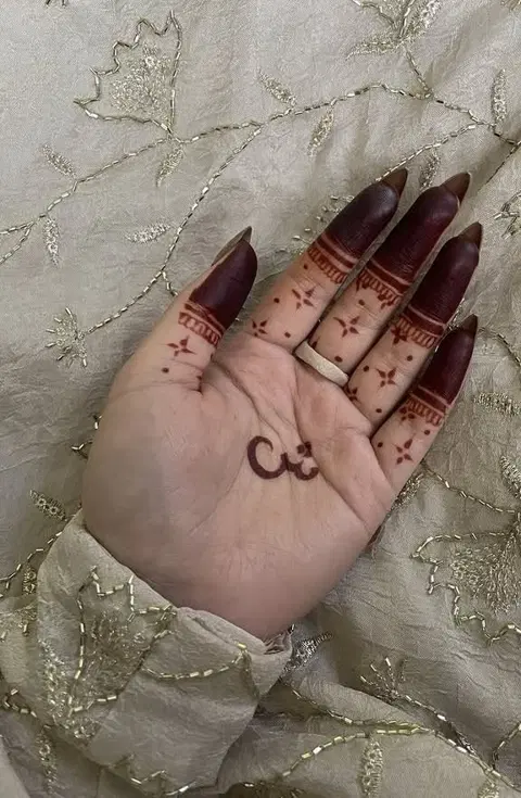 bridal simple circle finger mehndi design
