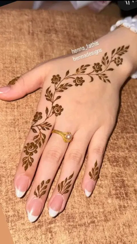 arabic minimal back hand mehndi design