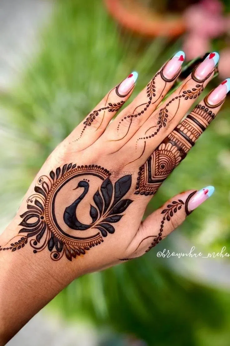Aesthetic Simple Back Hand Mehndi Design with Peacock