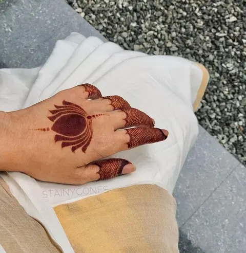 aesthetic minimal lotus back hand mehndi design