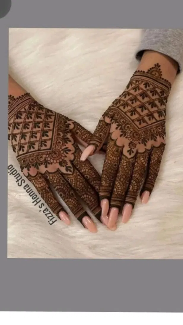 Bridal Back Hand Mehndi Design with Figures and Hearts for Eid