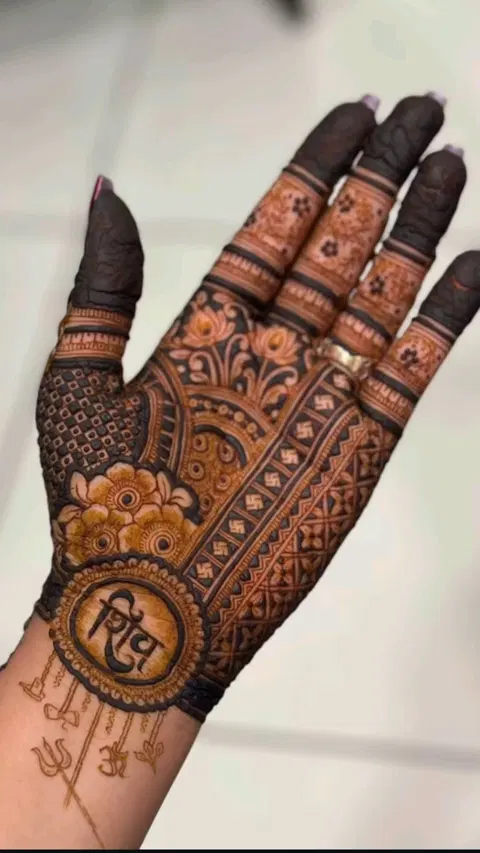 bridal indian deity finger mehndi design
