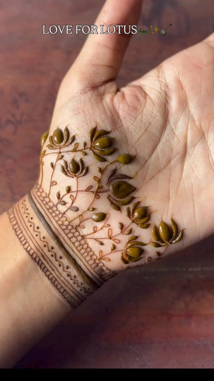 Aesthetic Minimal Back Hand Mehndi Design with Flowers and Lotus for Eid