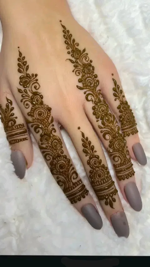 aesthetic arabic bel back hand mehndi design