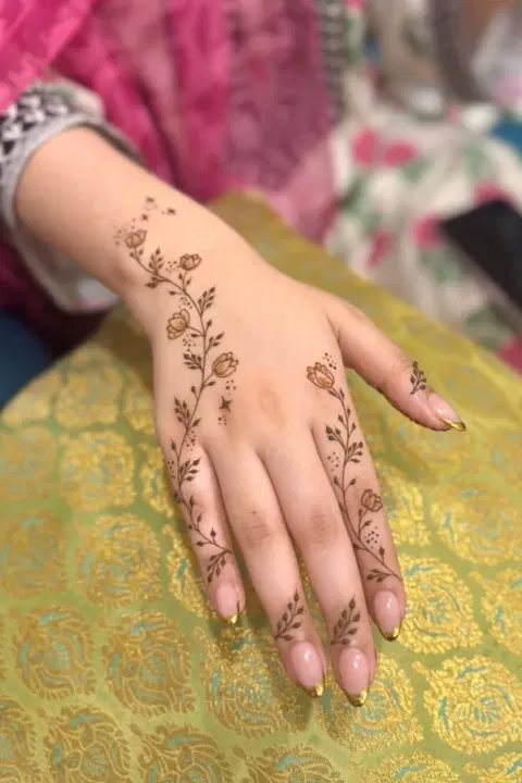 aesthetic arabic flower back hand mehndi design