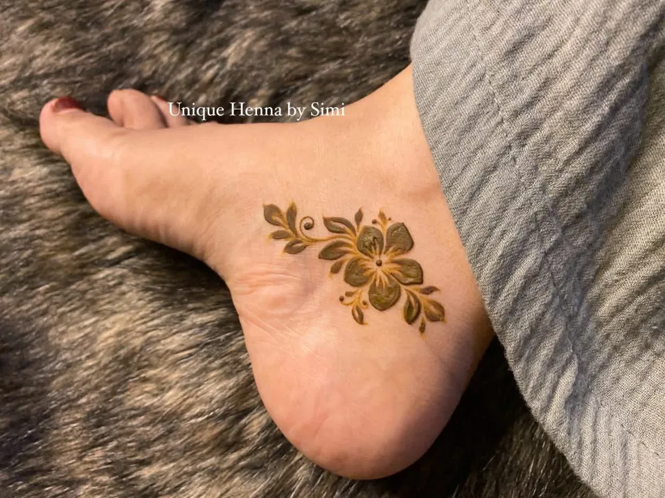 Aesthetic Arabic Back Hand Mehndi Design with Deity, Flowers and Jaal