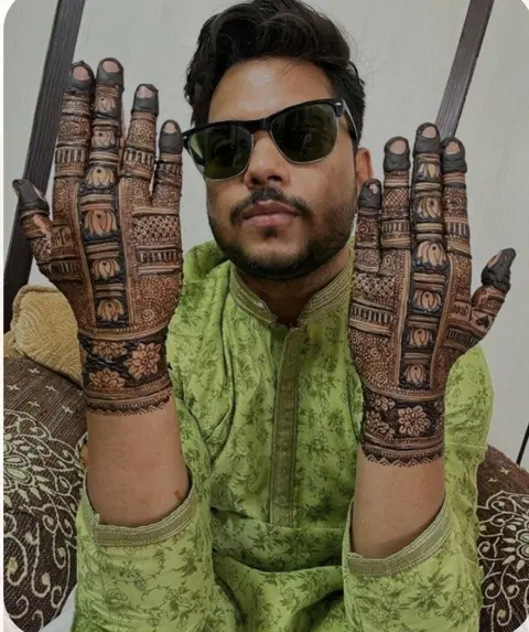 bridal deity back hand mehndi design