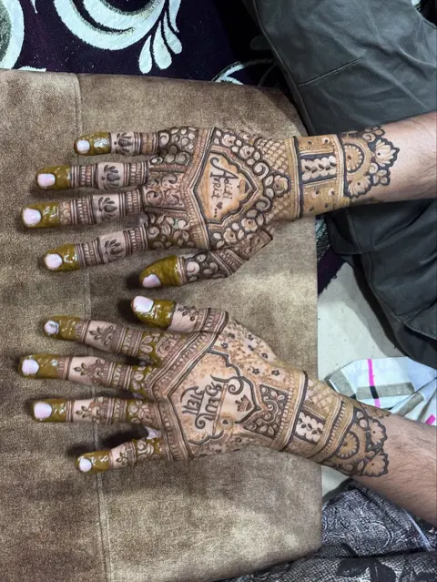 bridal simple deity back hand mehndi design