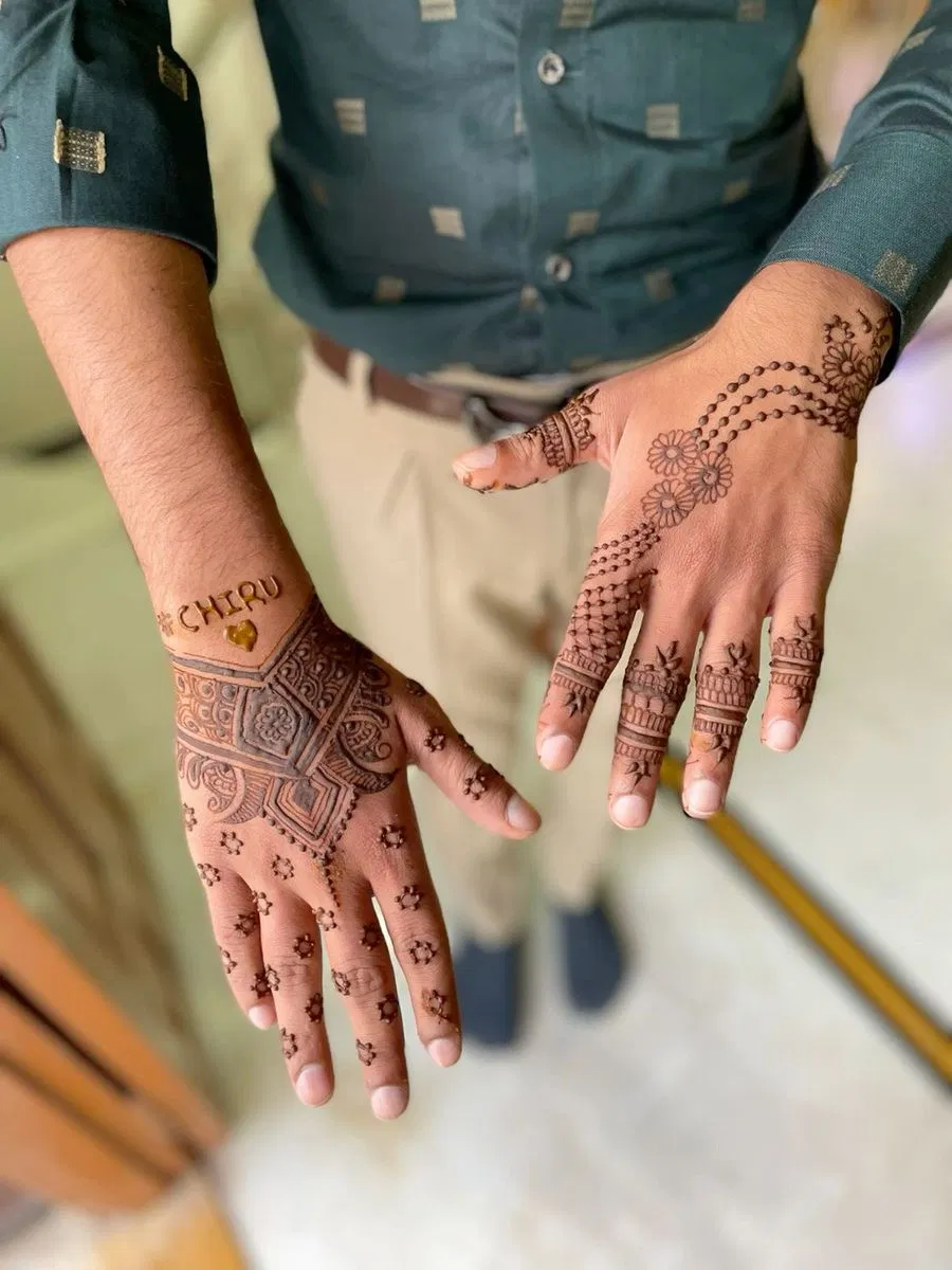 Royal Simple Back Hand Mehndi Design with Deity (2)