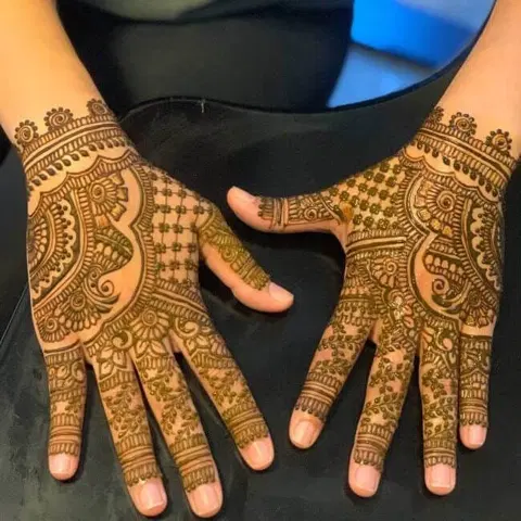 bridal deity back hand mehndi design