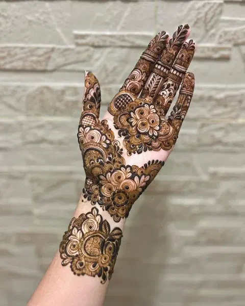 aesthetic arabic flower back hand mehndi design