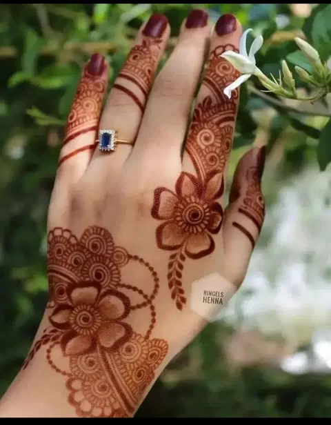aesthetic arabic flower back hand mehndi design