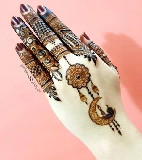 arabic stylish moon back hand mehndi design
