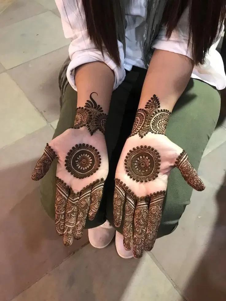 Simple Stylish Arm Mehndi Design with Gol Tikki and Deity
