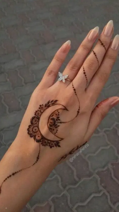 aesthetic arabic moon finger mehndi design