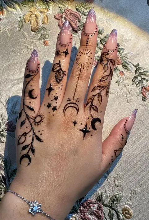 aesthetic arabic moon finger mehndi design